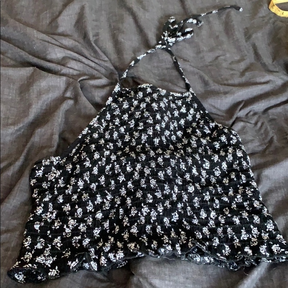 Black and white floral halter crop top.
